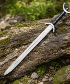 Celtic War Sword with polished stainless steel blade displayed on a moss-covered log.