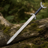 Decorative Celtic knight sword featuring a polished blade and crescent crossguard.