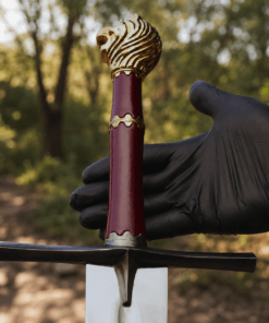 Chronicles of Narnia Prince Sword Replica featuring the Gold Rhindon design with a polished stainless steel blade and lion-head pommel.