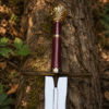 Chronicles of Narnia Prince Sword Replica featuring the Gold Rhindon design with a polished stainless steel blade and lion-head pommel.