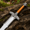 Conan Sword Replica with polished stainless steel blade and ornate medieval crossguard for cosplay and collectors.
