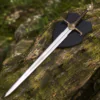 Dark Sister-inspired replica sword with polished stainless steel blade and ornate metal hilt mounted on a decorative wall plaque.