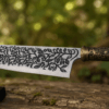 Vorpal Blade Replica inspired by Alice: Madness Returns displayed on a black stand with an engraved stainless steel blade.