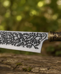 Vorpal Blade Replica inspired by Alice: Madness Returns displayed on a black stand with an engraved stainless steel blade.