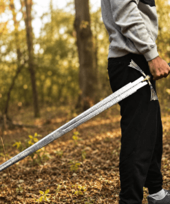 Dark Sister Sword replica with Damascus-style blade and ornate gold crossguard inspired by Game of Thrones.