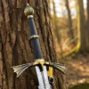 Dark Sister Sword replica with Damascus-style blade and ornate gold crossguard inspired by Game of Thrones.