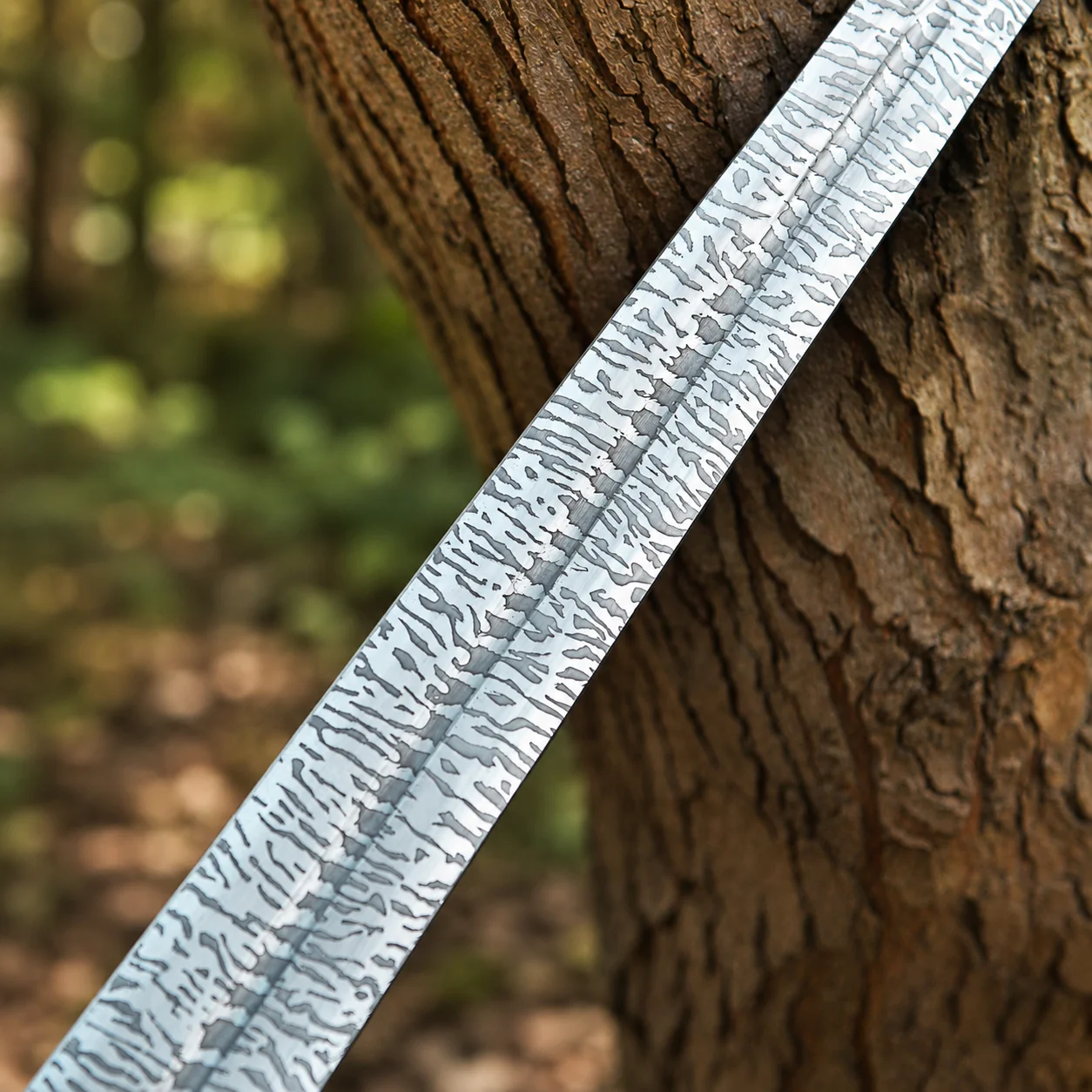 Dark Sister Sword replica with Damascus-style blade and ornate gold crossguard inspired by Game of Thrones.