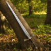 Dark Sister Sword replica with Damascus-style blade and ornate gold crossguard inspired by Game of Thrones.