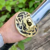 Yin Yang Katana with polished steel blade, black wrapped handle, gold-tone Yin Yang guard, and matching black scabbard.