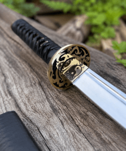 Yin Yang Katana with polished steel blade, black wrapped handle, gold-tone Yin Yang guard, and matching black scabbard.
