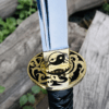 Yin Yang Katana with polished steel blade, black wrapped handle, gold-tone Yin Yang guard, and matching black scabbard.