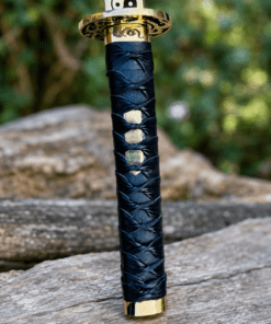 Yin Yang Katana with polished steel blade, black wrapped handle, gold-tone Yin Yang guard, and matching black scabbard.