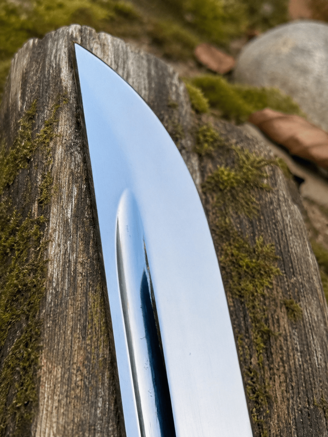Yin Yang Katana with polished steel blade, black wrapped handle, gold-tone Yin Yang guard, and matching black scabbard.